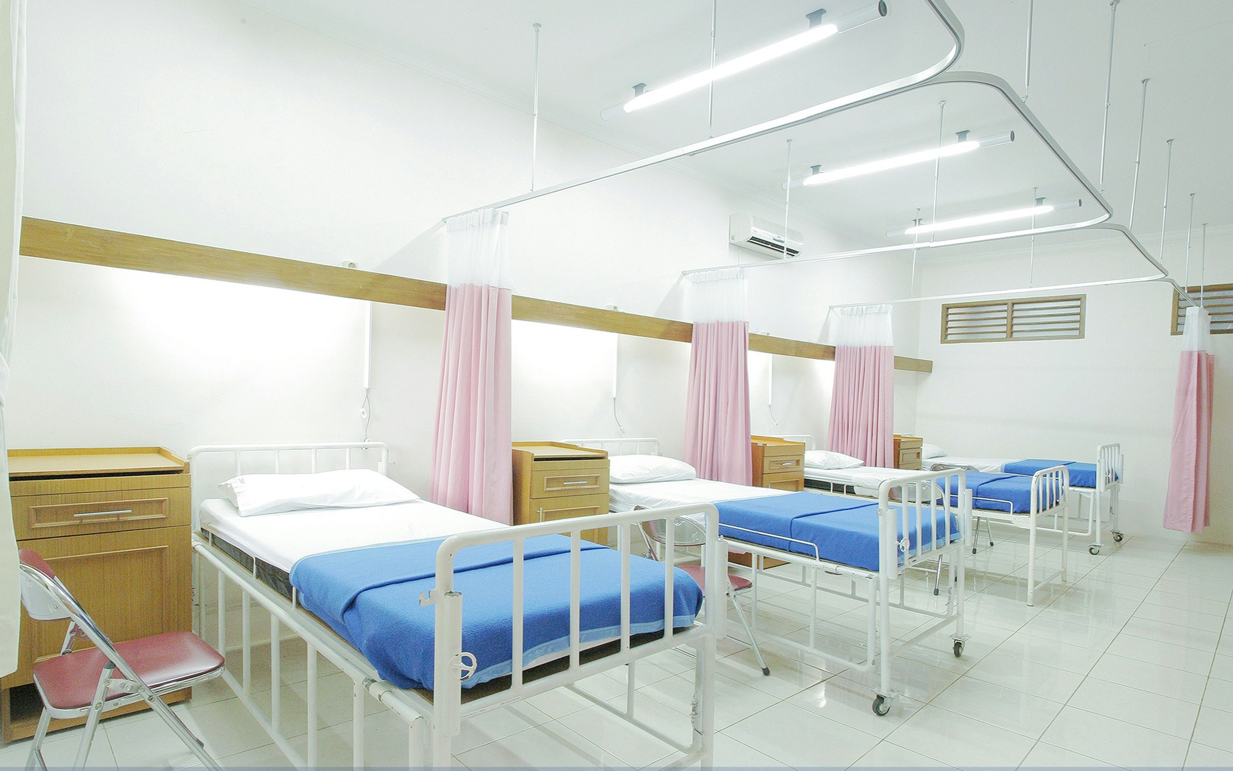 Delivered hospital ward with beds ready for operational handover.